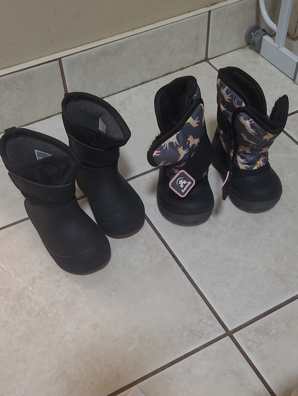 2 Pairs of boots.Bogs And Kamik Kids Black Boots with Pink and Yellow Unicorns